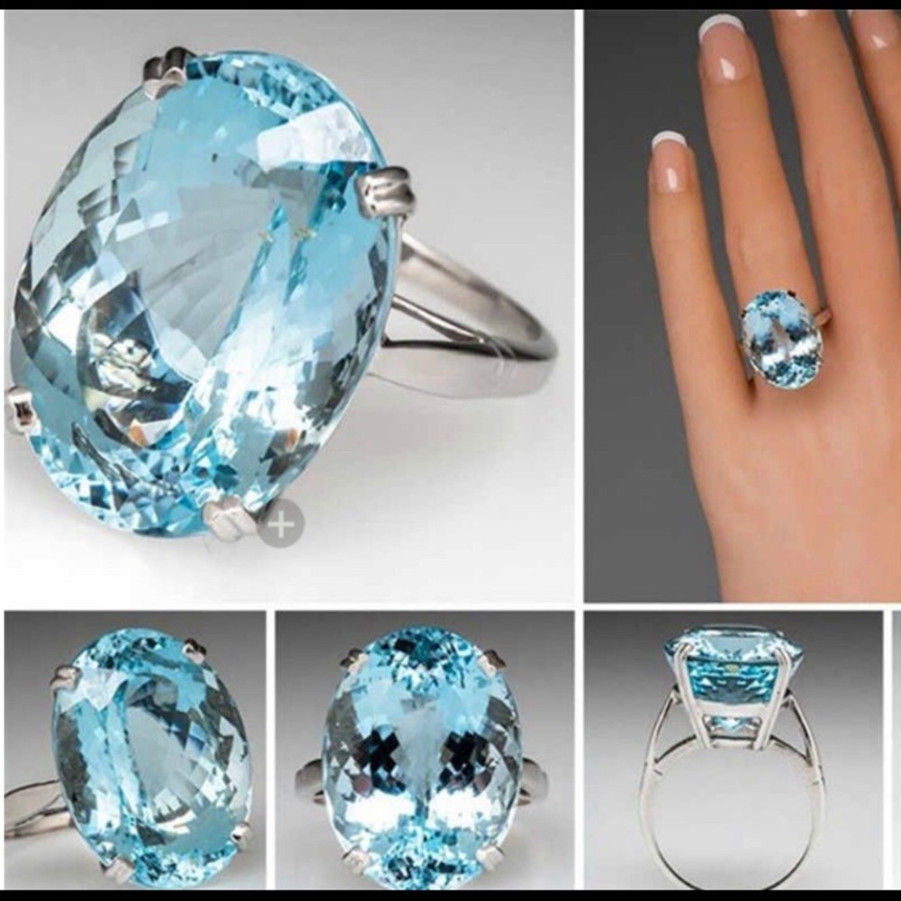 Big Light Blue Oval Crystal Zircon 18K WGF Ring